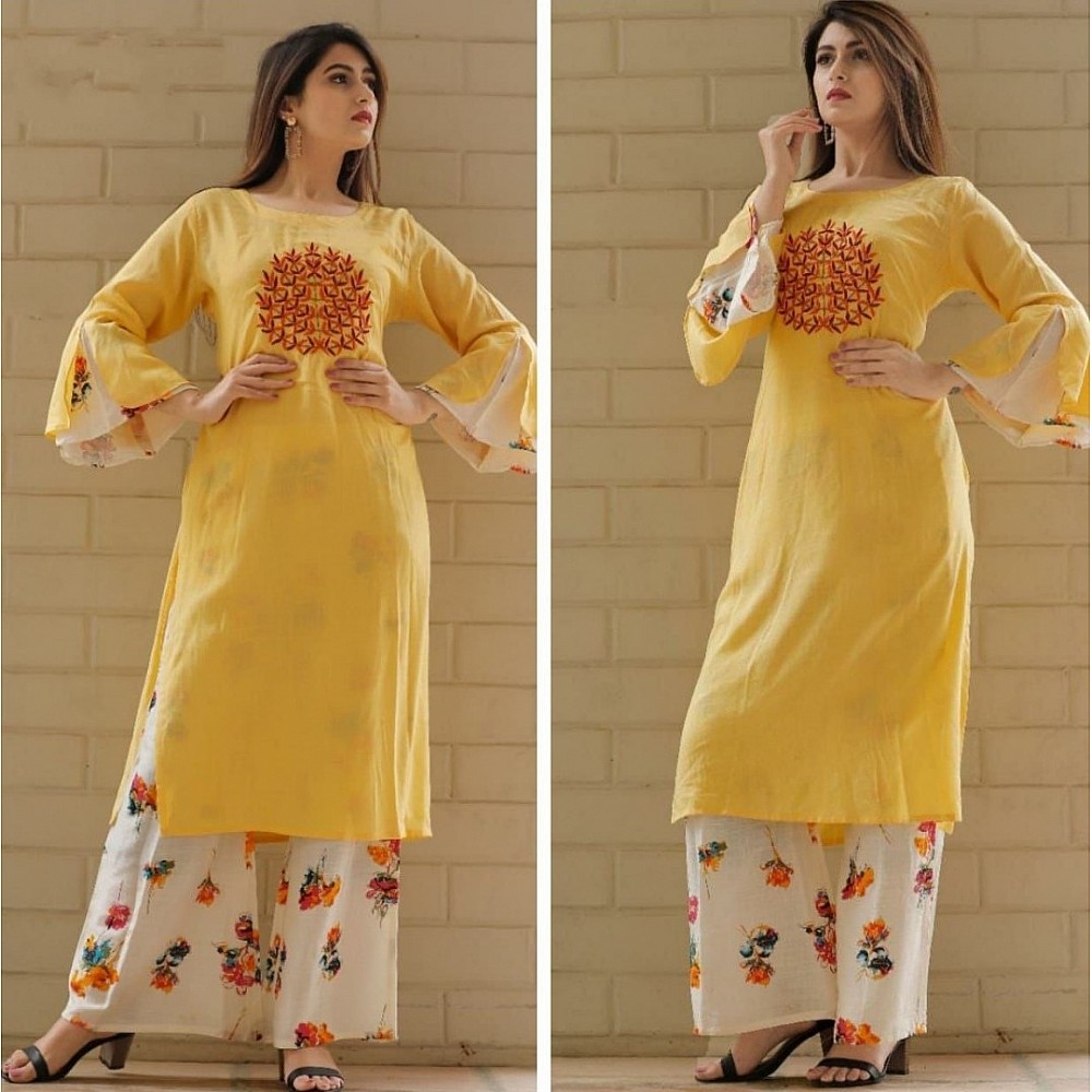 Light yellow heavy rayon hand embroidered work suit with plazzo