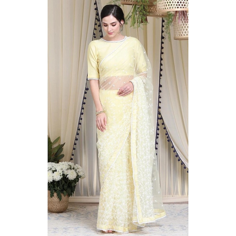 Light yellow heavy soft net thread work elegant look saree
