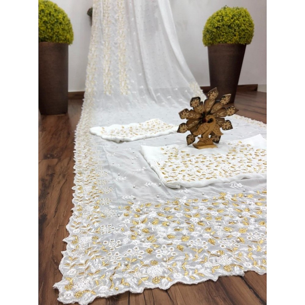 Off white georgette embroidered with pearl work saree