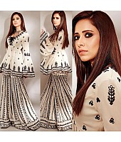 Off white heavy embroidered sharara suit