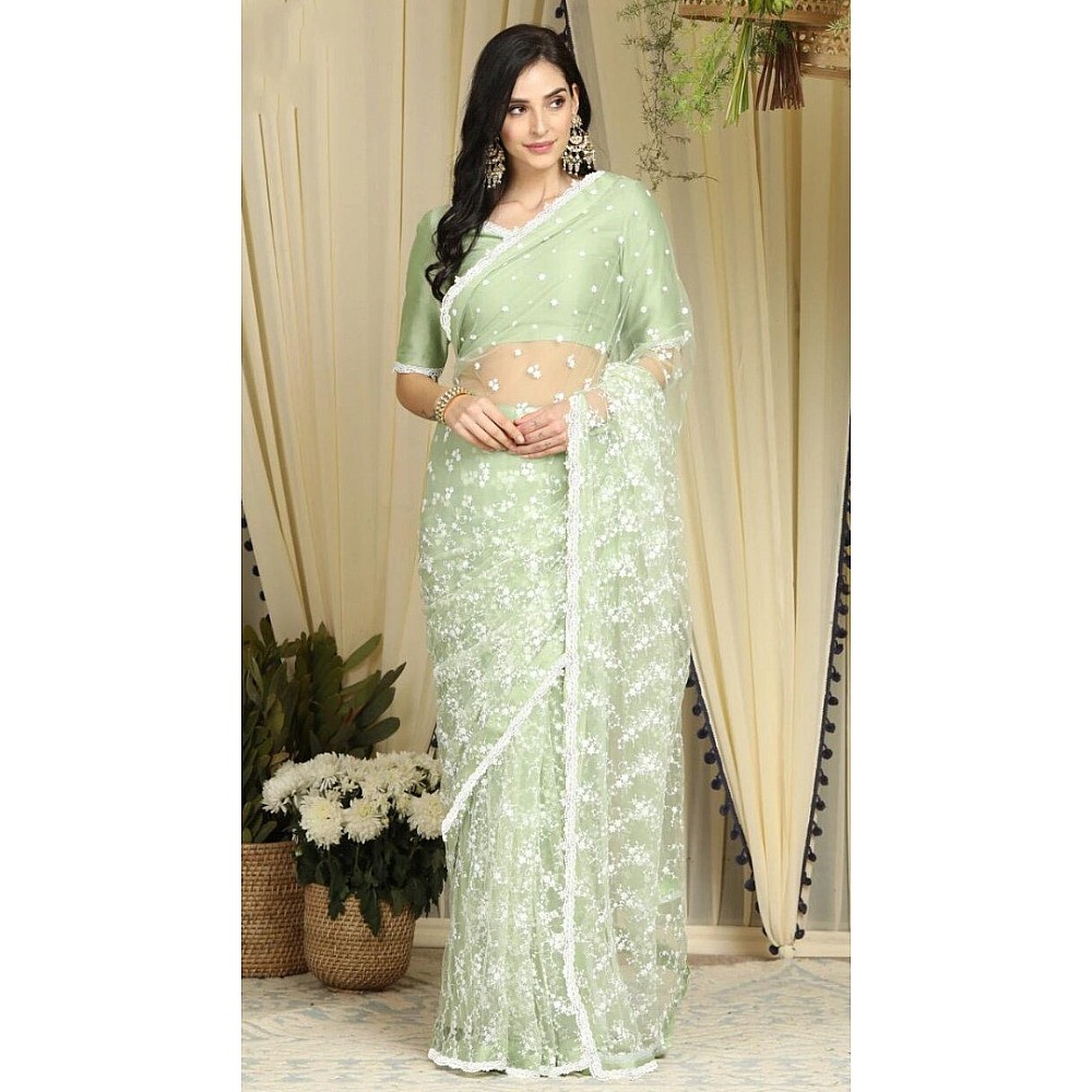 Pista green heavy soft net thread work elegant look saree