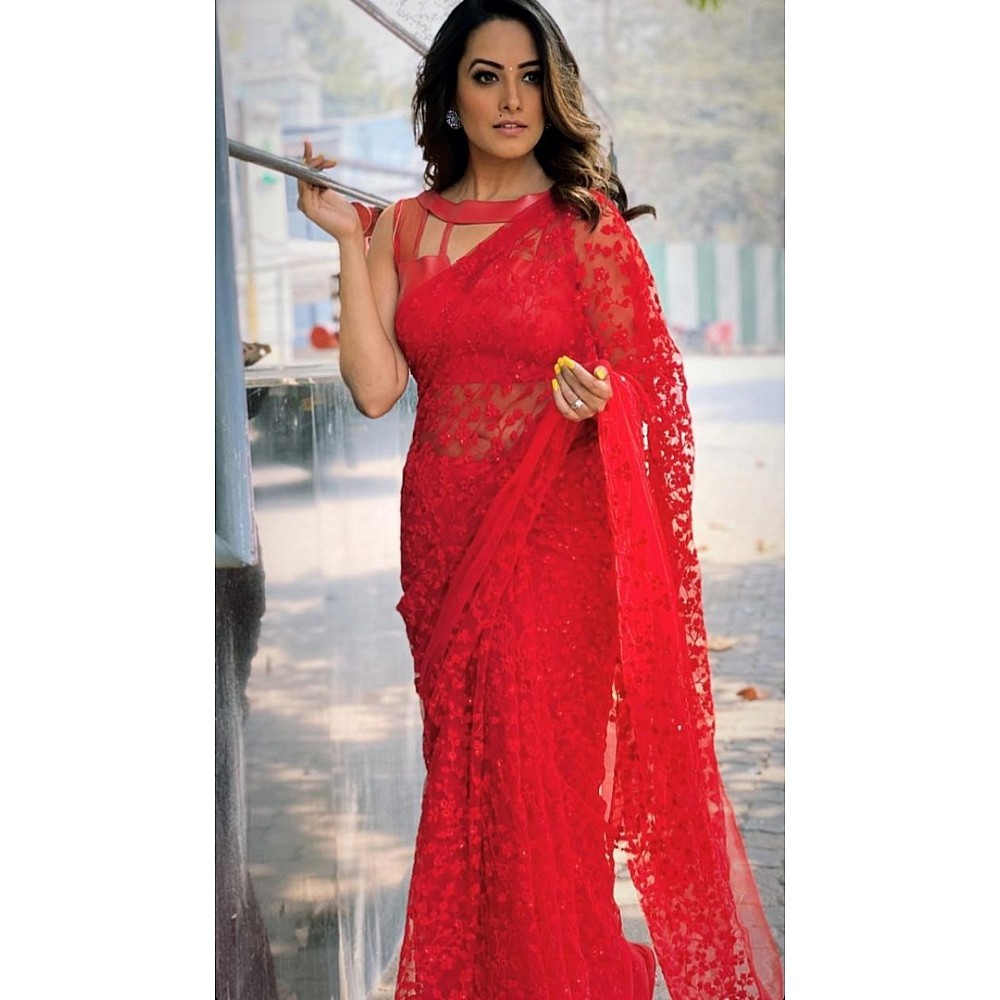 Red soft net heavy embroidered saree