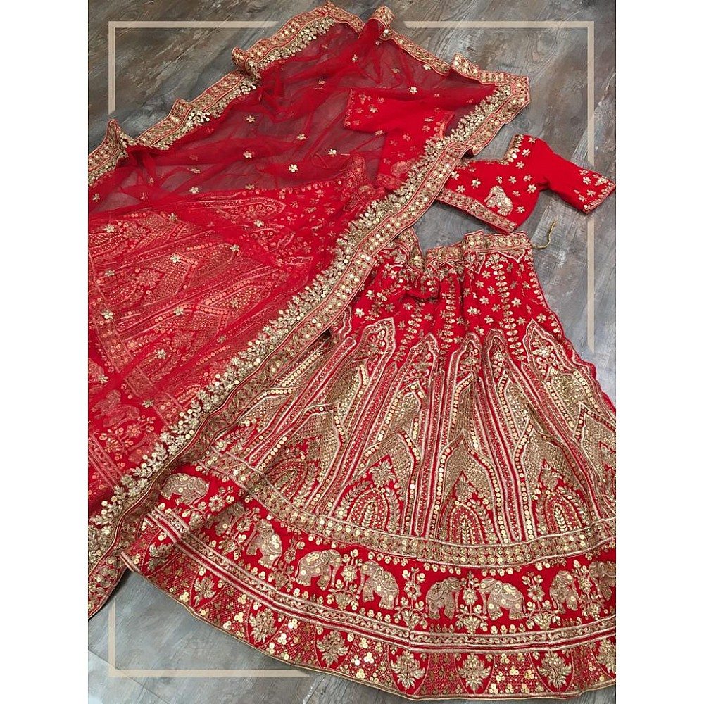 Red velvet heavy embroidered bridal lehenga choli