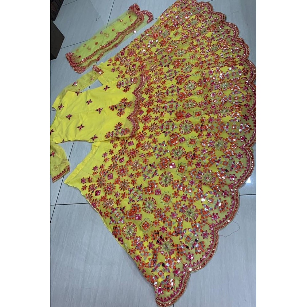 Yellow georgette sequence thread and foil mirror work lehenga choli