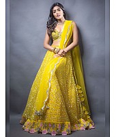 Yellow net sequence and thread embroidered ceremonial lehenga choli
