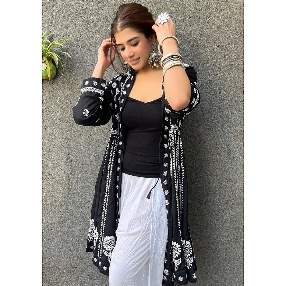 Black and white embroidery work dhoti suit with shrug