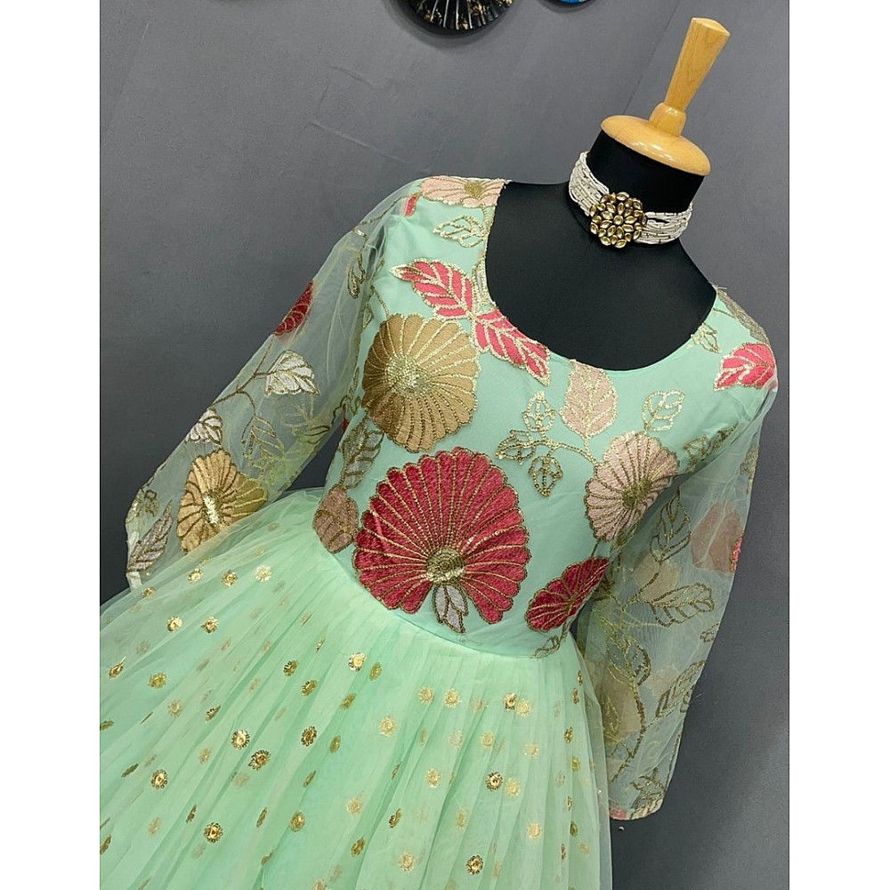 Pista green georgette and soft net embroidered gown