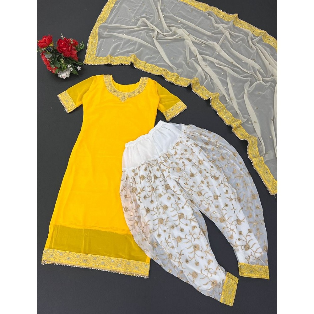 Yellow fancy thred and sequence work punjabi suit for haldi ceremony