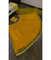Yellow net sequence embroidery work ruffle lehenga choli for ceremony
