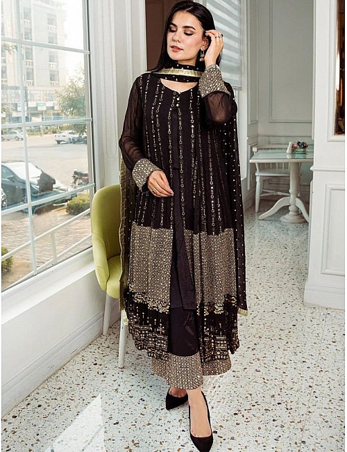 Black heavy embroidery worked salwar suit with shrug