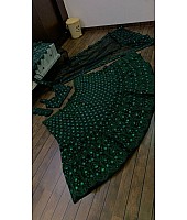 Green net heavy embroidery worked lehenga for wedding