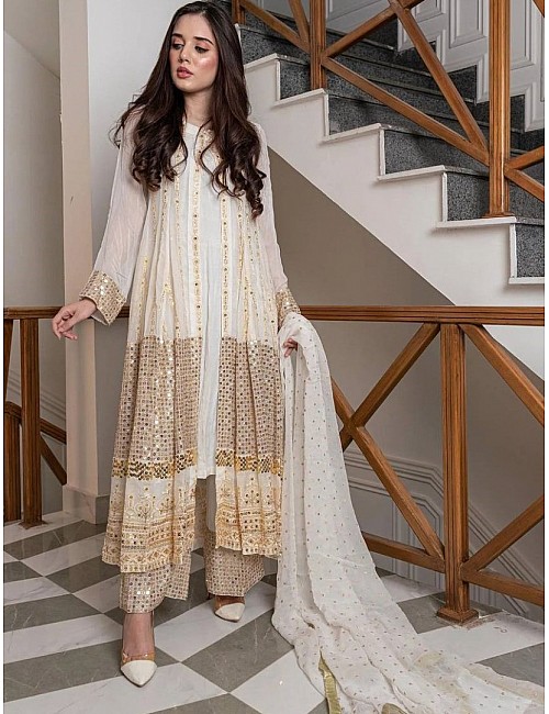 White heavy embroidery worked salwar suit with shrug