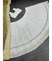 White heavy embroidery worked wedding lehenga choli