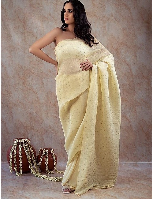 Yellow crushed georgette khatli handwork designer party wear saree