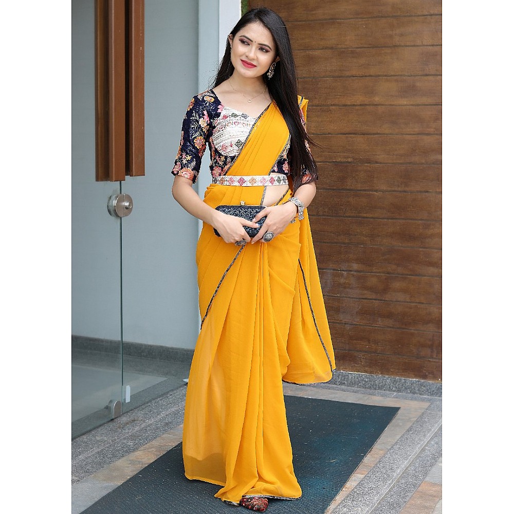 Yellow georgette designer saree with stitched blouse