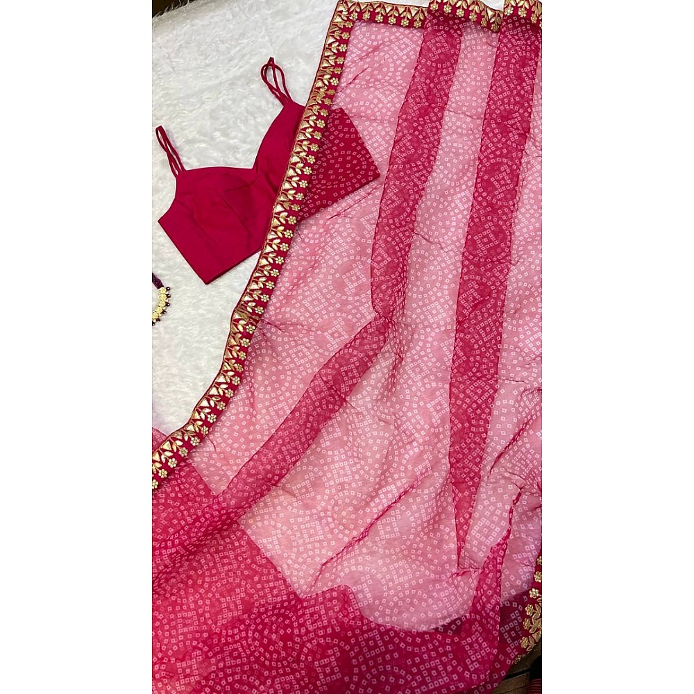 Pink bandhni print organza saree
