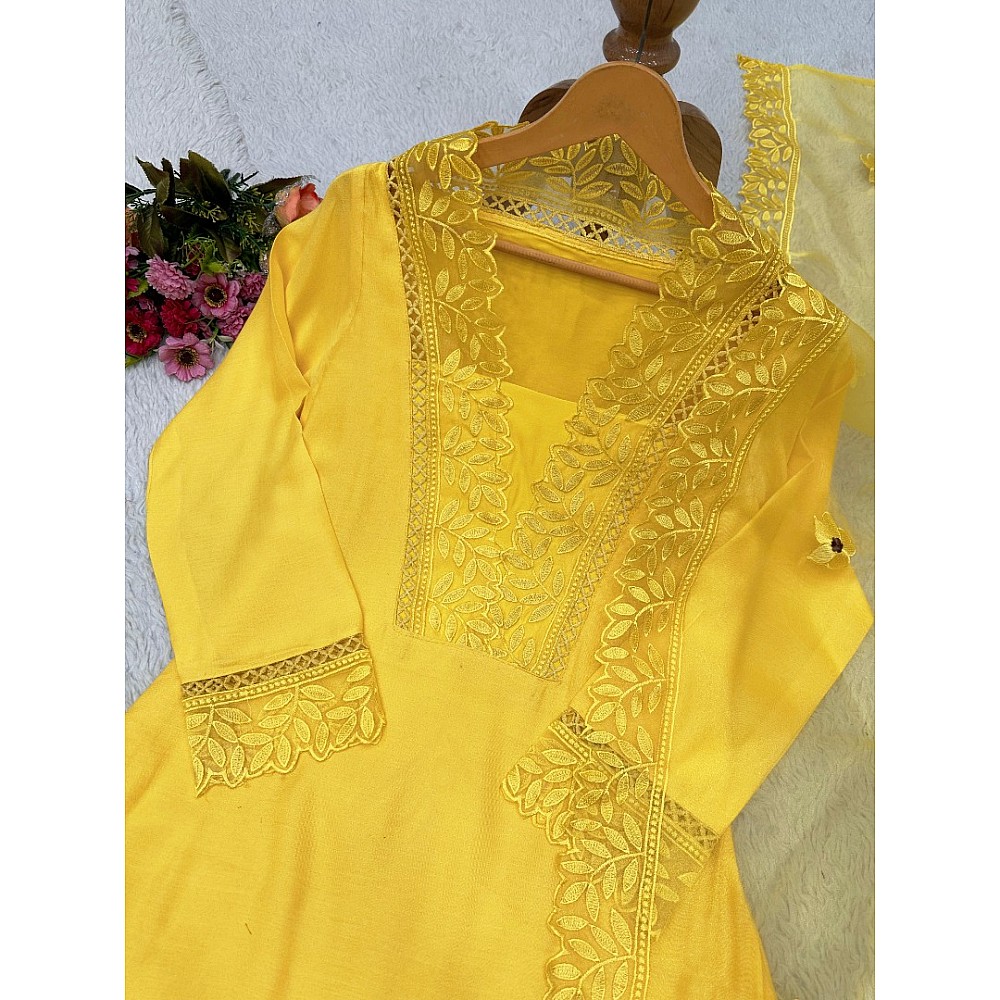 Yellow ceremonial salwar suit with organza dupatta