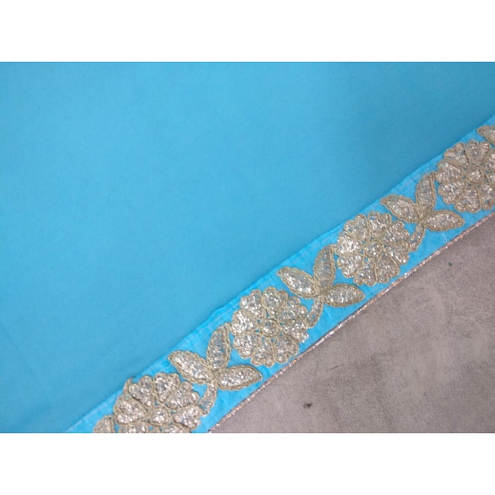 Sky blue and pink colored georgette embroidered partywear saree