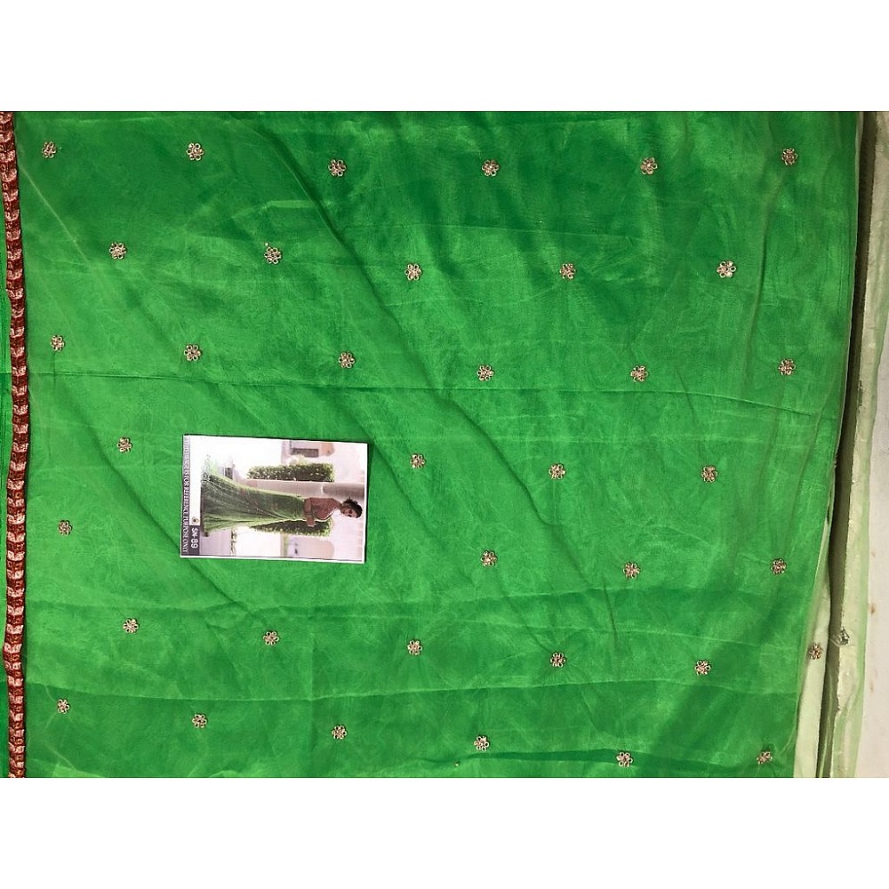 Trendy green embroidered mono net wedding saree